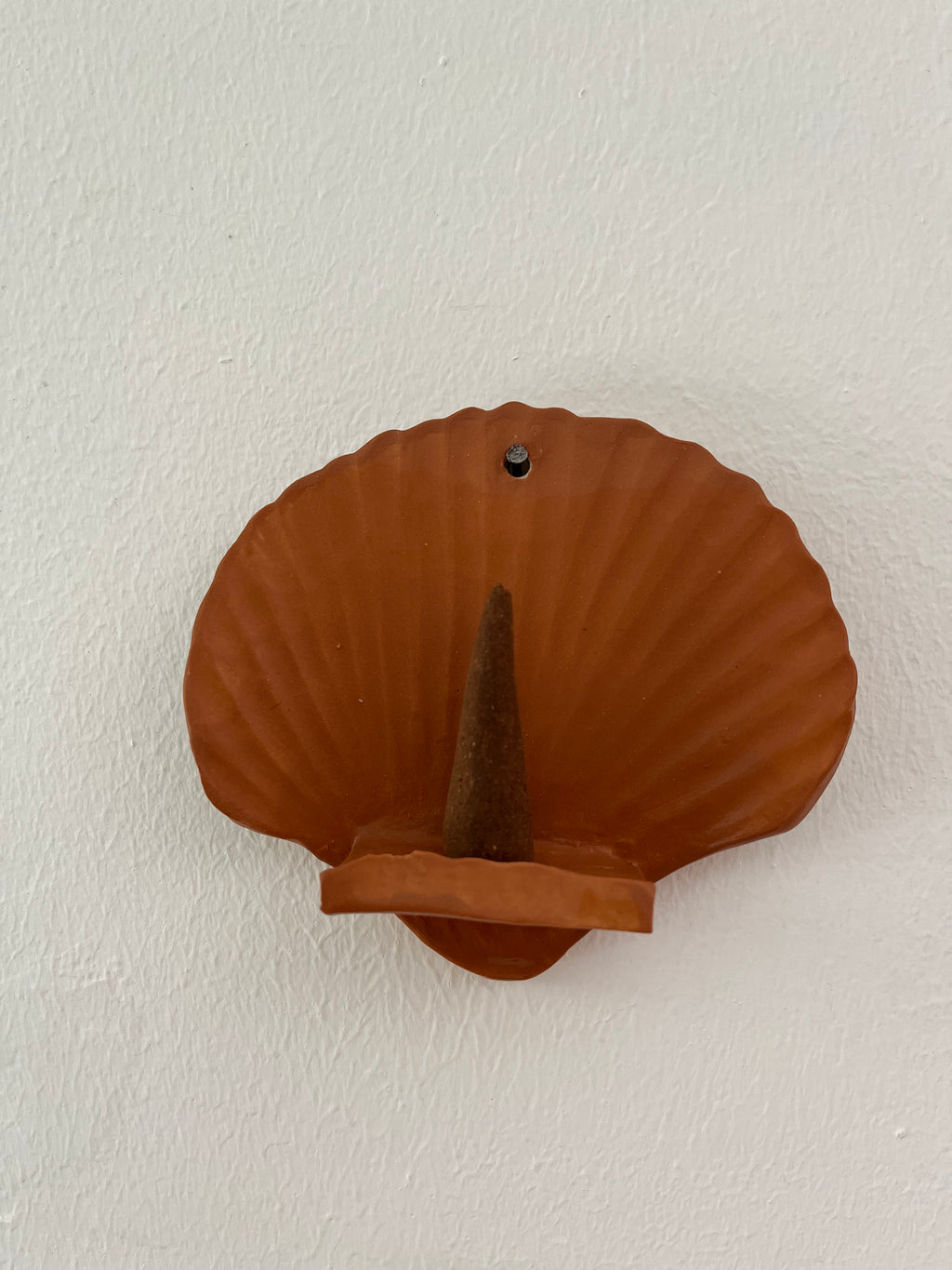 Hangend schelp altaar