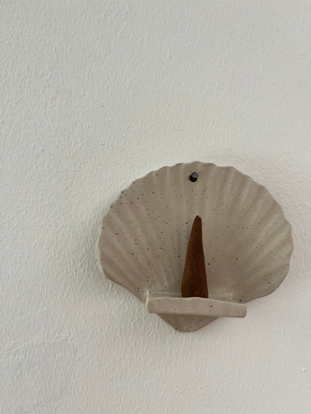 Hangend schelp altaar